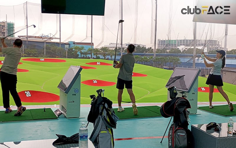 golfers enjoying the benefits of a driving range