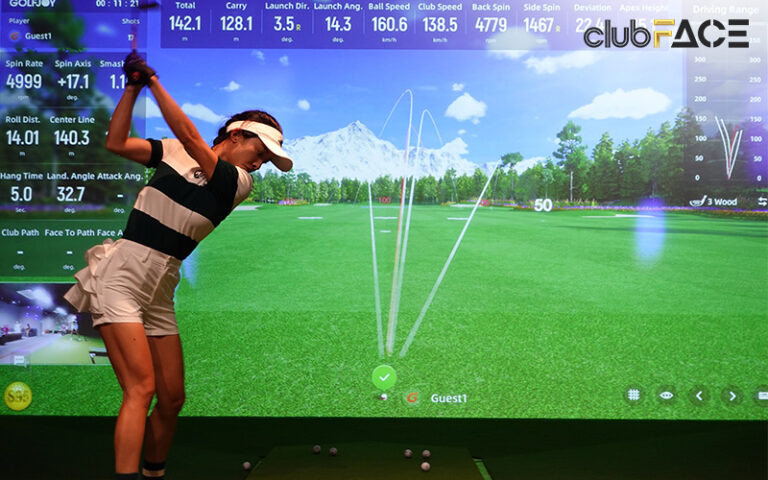 Golfer using simulator equipped with tracer tech