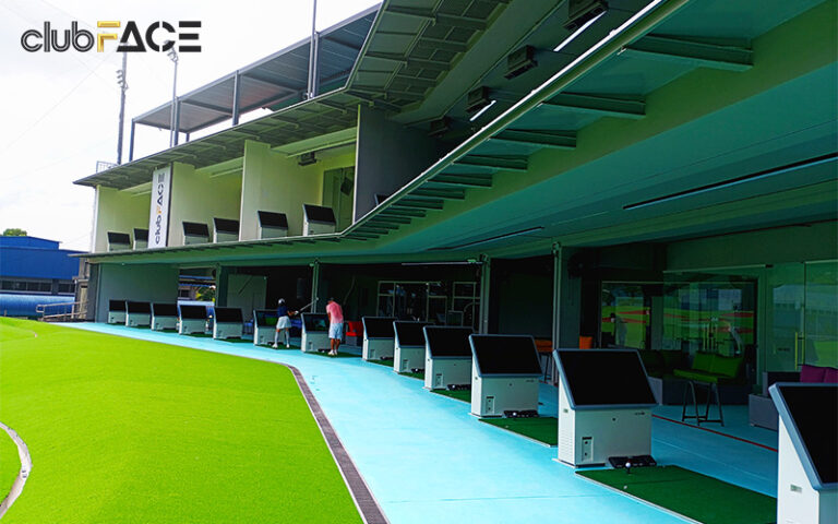 golfers golfing on clubFACE's driving range