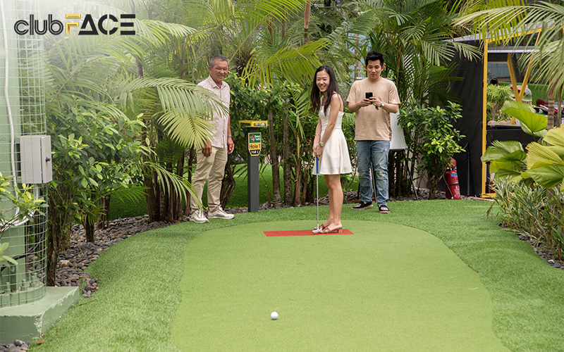 people playing gold outdoors
